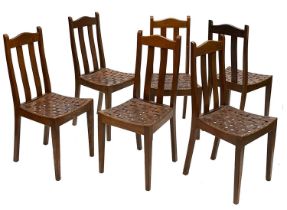 Arthur Simpson of Kendal, a set of six Art and Crafts oak dining chairs, each with leather lattice