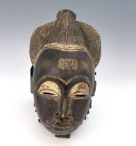 Tribal Interest, Baule Tribe, a portrait mask, 33cm high
