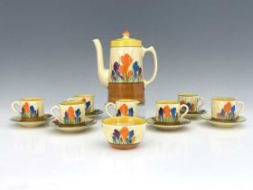 Clarice Cliff for Wilkinson and Newport Pottery, a Crocus pattern coffee set, including coffee