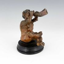 Robert Wallace Martin for Martin Brothers, a stoneware musical imp figure, 1892, modelled playing