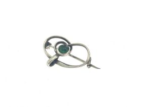 Charles Horner, an Arts and Crafts silver and green gem set brooch, Chester circa 1910, knotted