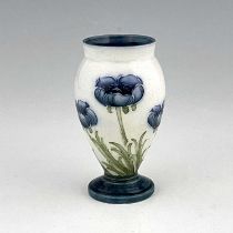 William Moorcroft for James MacIntyre, a miniature Blue Poppy vase, circa 1903, footed and