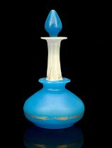 Baccarat (attributed), a blue and white opaline glass perfume bottle, circa 1840, the squat