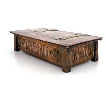 An Arts and Crafts copper lidded ink casket, planished cuboid form with tapered obelisk legs, the