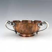 An Arts and Crafts silver handled copper bowl, William Hutton and Sons, Sheffield circa 1905,