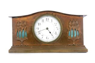 Glasgow School, an Arts and Crafts copper and Ruskin cabochon clock, cuboid plinth form with