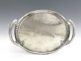 Archibald Knox for Liberty & Co, a Tudric pewter tray, circa 1905, oval form with integral handles