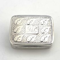 A George III silver vinaigrette, of rounded rectangular form, the cover decorated with eight