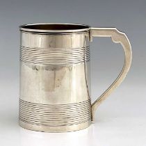 A George III silver mug, of cylindrical form, the body decorated with coopered bands, initialled 'M'