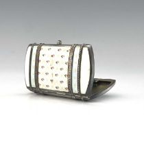 An early twentieth-century silver and enamel cigarette case, of rounded cushioned rectangular