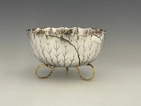 Christopher Dresser (Attributed) An Edwardian silver and parcel-gilt naturalistic bowl, in the