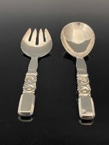 Georg Jensen. A matched pair of twentieth-century Danish silver salad servers, comprising serving