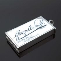 A Victorian silver and enamel calling card vesta case, of rectangular form, with applied enamel