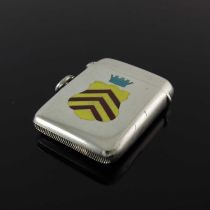 An Edwardian silver and enamel vesta case, of rounded rectangular form, applied in polychrome enamel