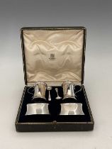 Hunt & Roskell Ltd A cased silver condiment set, comprising a pair of pepper pots and pair of salt