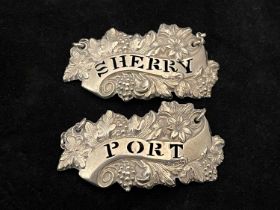 A pair of late Victorian silver wine labels or bottle tickets, each die-stamped with central