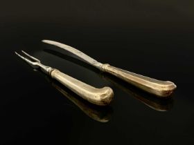 An eighteenth-century Continental silver-coloured metal cased knife and two-prong fork set, each