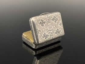 A George III silver vinaigrette, of rounded rectangular form, the exterior decorated with bright-