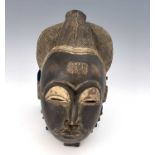 Tribal Interest, Baule Tribe, a portrait mask, 33cm high