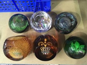 Six Caithness and Selkirk glass paperweights, including Jubilee, planets, limited edition floral