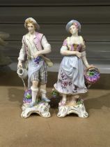 A pair of Continental porcelain figures by Rudolf Kammer of Volstedt, Thuringia, 20th century,