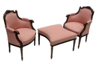 A pair of fauteuil and matching stool to form a chaise, of Louis XVI design, carved frames with rams