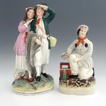 A Staffordshire figure group, late nineteenth-century, 'Fisherman and Companion' figure modelled