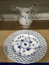 A Royal Copenhagen blue fluted lace pattern jug, baluster form, shape No.443, 20cm high, together