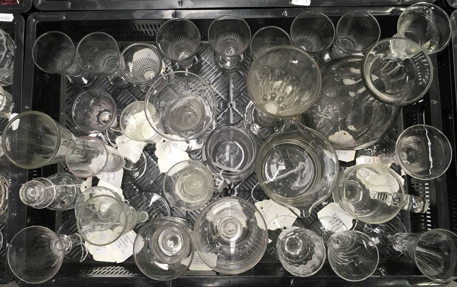 A collection of 19th century and later drinking glasses, including airtwist, wine glasses,