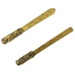 Two Japanese brass and mixed metal page turners, the blades engraved with naturalistic floral