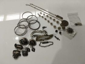 A quantity of silver jewellery, including identity bracelets, bangles etc, (parcel)