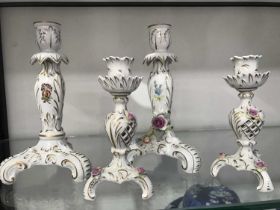 Two pair of Continental porcelain candlesticks (4)