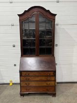 An Edwardian bureau-bookcase W: 94 cm D: 49 cm H: 230 cm