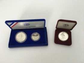 A United States silver proof coins, including 1986 Liberty dollar and half dollar, and Los Angeles