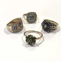 Four 9ct gold gem-set dress rings