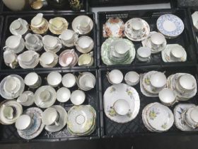 A collection of English porcelain tea wares, including Gladstone China, Regent Bone China, Melba