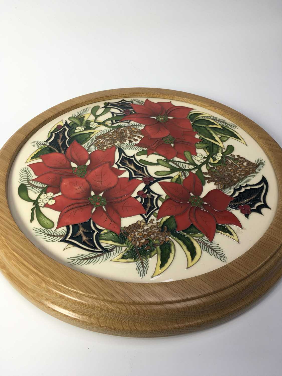 Helen Dale for Moorcroft, That Festive Feeling Plaque, circular form, circa 2015, tubeline - Image 2 of 2