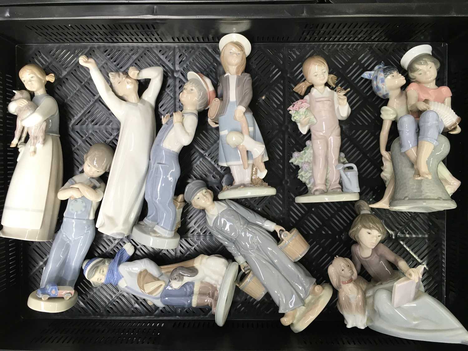 A collection of ten Lladro figures, including A Lesson Shared, Caribbean Kiss, Dutch Boy with Milk - Image 2 of 4