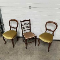 A pair of Victorian walnut balloon back dining chairs, upholstered seats, and an Edwardian