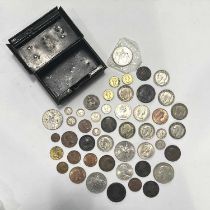 A collection of coins, including Elizabeth II anniversary of accession, George V shilling, George
