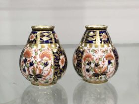 A pair of Royal Crown Derby Imari pattern vases, ovoid form, circa 1905, decorated in the Imari