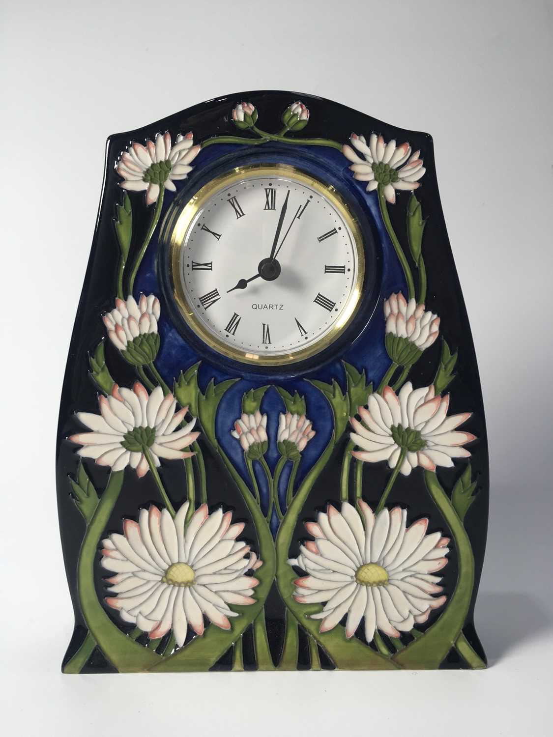 Paul Hilditch for Moorcroft, a Meadow Daisy mantel clock, impressed and painted marks, 21cm high
