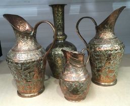 Three embossed copper jugs, brass lamp base etc (4)