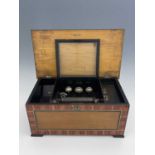 A 19th century Swiss 10 air musical box, with three bells, simulated rosewood case with painted