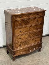 A red and white-veined marble-top chest of drawers, fitted five drawers, one short over four tall,