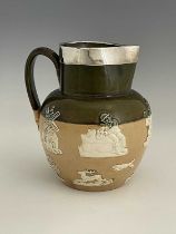 A Doulton Lambeth sprigged stoneware jug, silver mounted, green and salt glazed with applied hunting