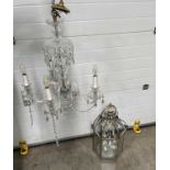 A hexagonal brass framed hall lantern, with six branch light fitting and bevelled glass panes,