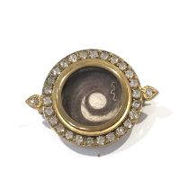 A 19th century yellow metal hairwork mourning brooch