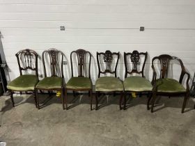 An Edwardian harlequin set of six upholstered dining chairs, including examples with turned and