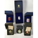 A collection of Halcyon Days enamelled trinket boxes, including Post box titled 'From Me to You With